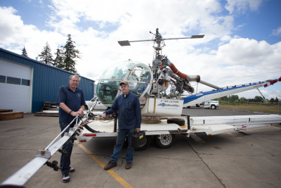 Western Helicopter president Rick Krohn, left, with Director of Maintenance Karson Branham. Western Helicopter owns eight helicopters (ranging in cost from $300,000 to $1.2 million) that costs about $1,200 per hour to fly. Branham is in charge of monitoring and repairing the multitude of parts and pieces of the aircraft that are regulated by the FAA. He estimates the helicopters take about an hour of maintenance per hour of flight. 